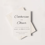 Timeless cursive wedding invitation featuring elegant script typography, minimalist layout, and soft neutral tones, styled with envelope for a refined modern wedding aesthetic