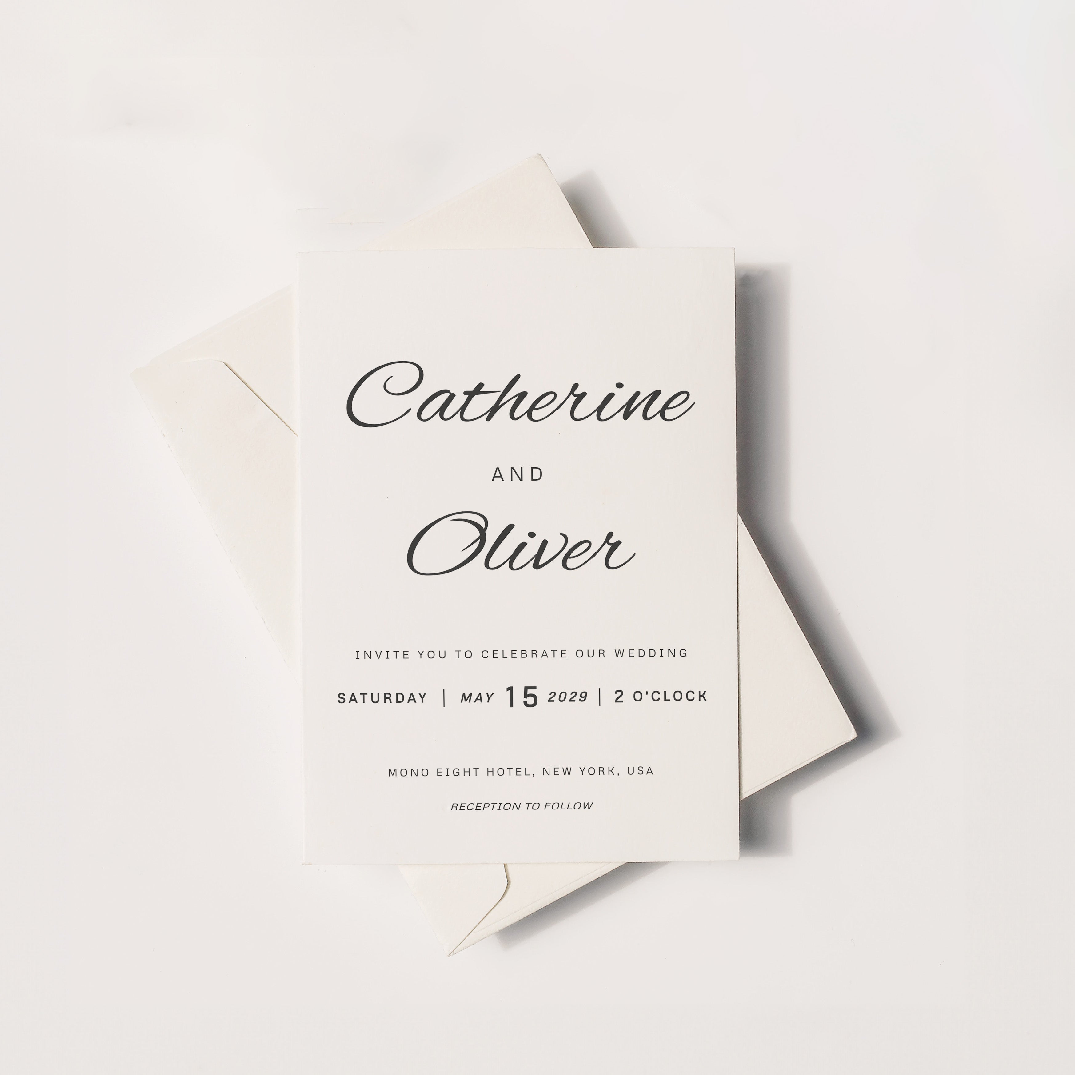 Timeless cursive wedding invitation featuring elegant script typography, minimalist layout, and soft neutral tones, styled with envelope for a refined modern wedding aesthetic