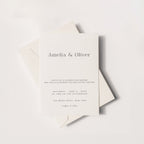 Minimalist wedding invitation mockup with envelope featuring elegant serif typography, neutral modern stationery design