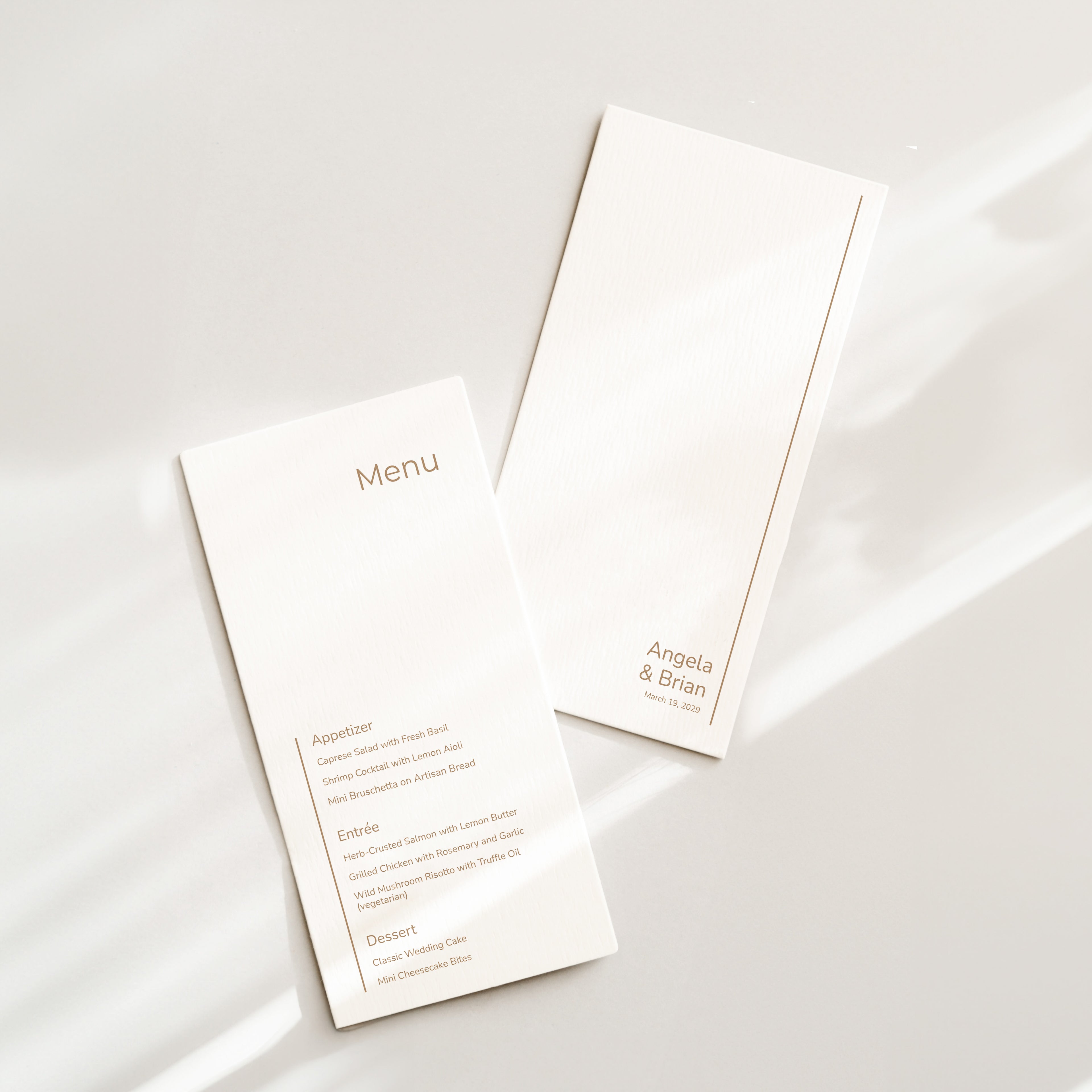 Signature line wedding menu with refined serif typography and linear accents, shown in a minimal editorial flat lay