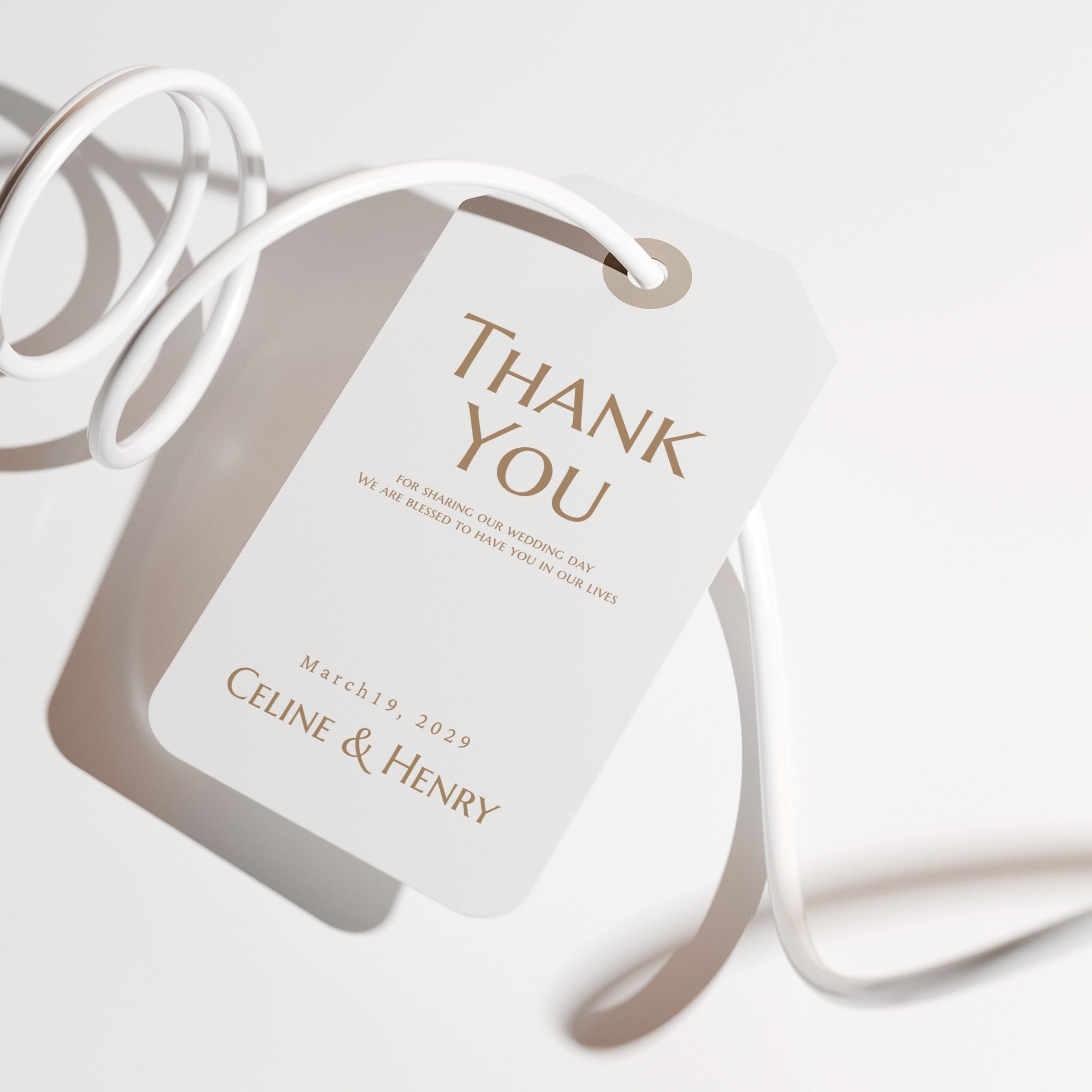 White keychain with 'Thank You' card on a white background