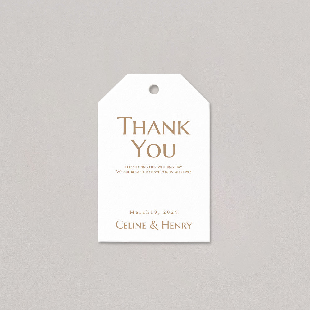 White tag with gold text 'Thank You' and personalized details on a gray background
