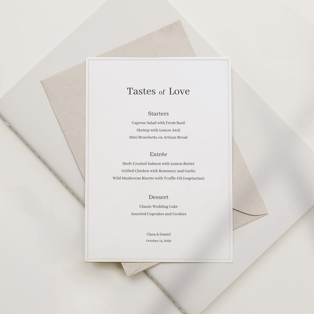Minimal wedding menu card featuring a centered serif layout with the title “Tastes of Love,” printed in soft black on off-white textured paper, styled with layered neutral envelopes in a clean, modern flat lay.