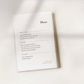 Minimalist Wedding Menu card with a list of food items on a white background