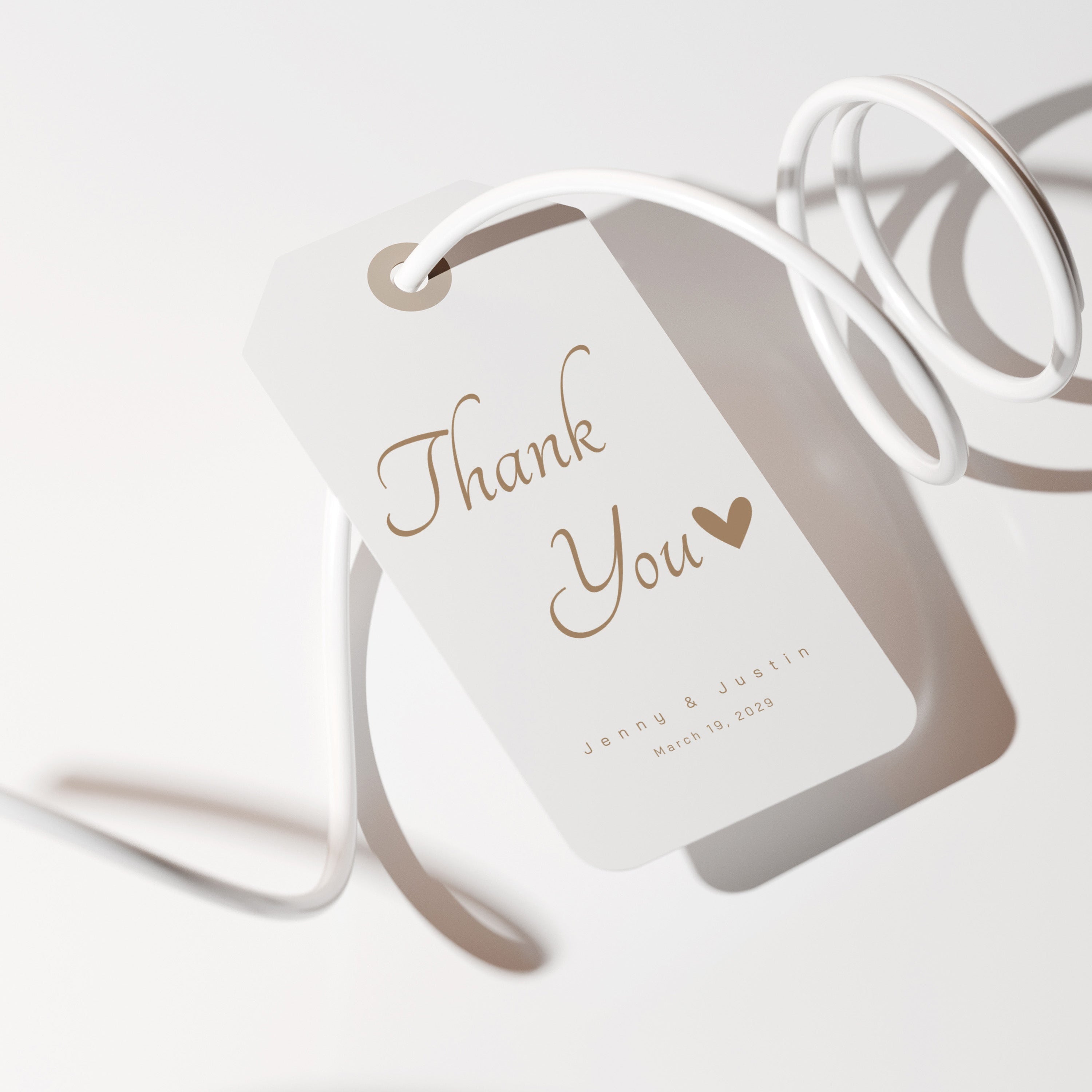 White dog tag with 'Thank You' and a heart on a white background