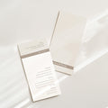 Minimal wedding menu design with horizontal band detail, refined typography, and balanced spacing, shown in two coordinated layouts with a clean, modern composition.