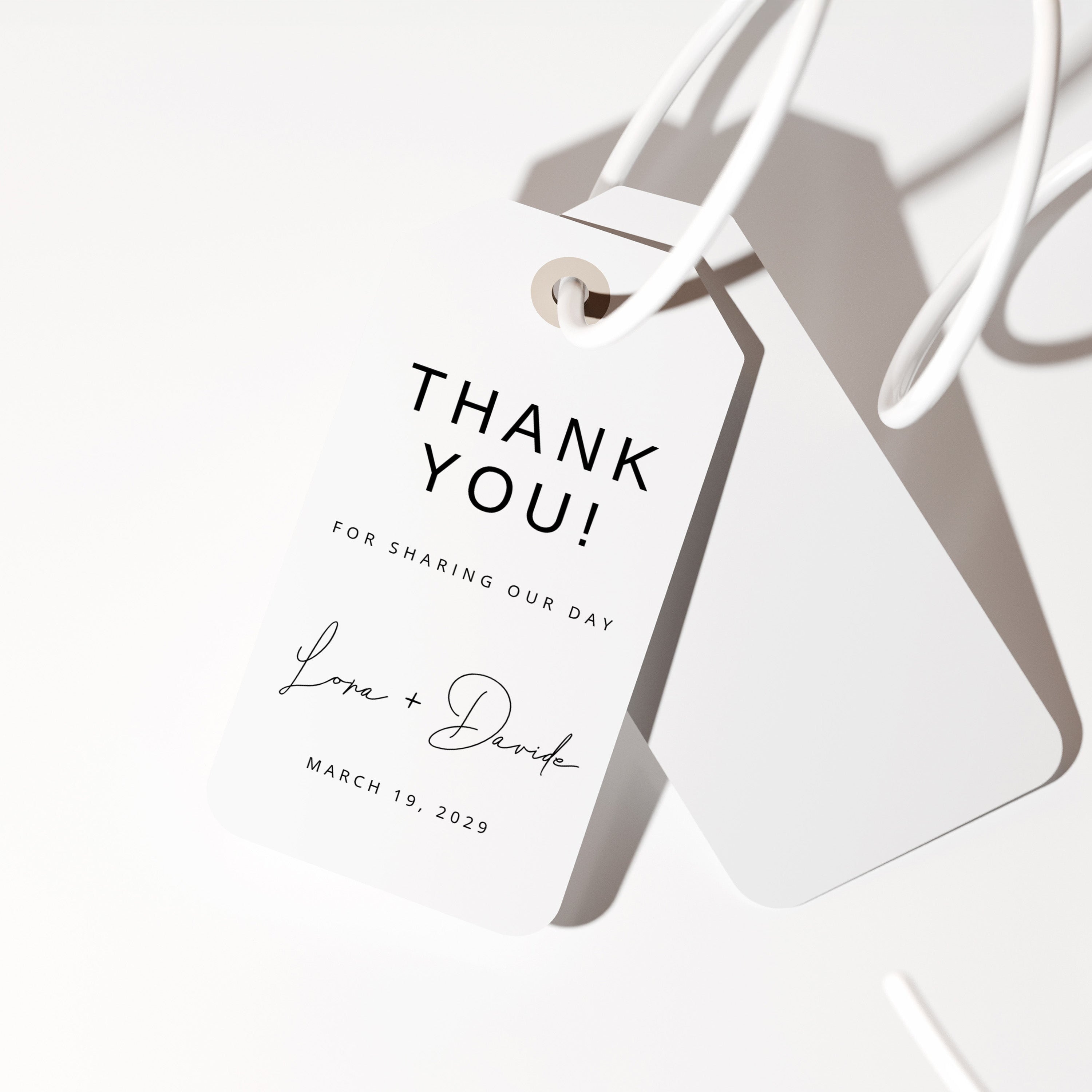 White gift tag with 'Thank You! For Sharing Our Day' text on a light background
