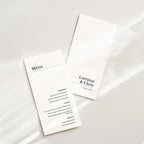Minimal wedding menu design with clean serif typography and structured layout, presented in a modern editorial style.