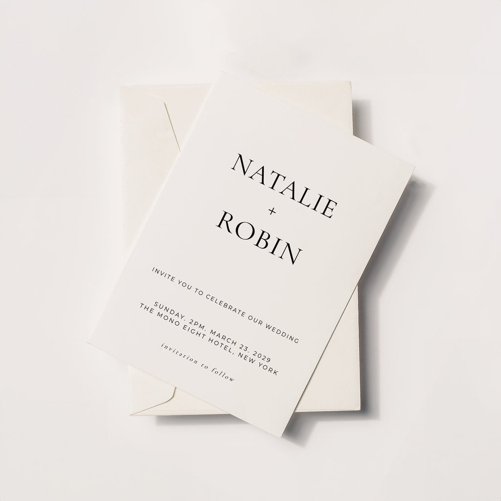 Minimal wedding invitation with bold serif typography and stacked name layout