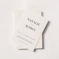 Minimal wedding invitation with bold serif typography and stacked name layout