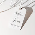 White tag with 'Sophia & James' text on a light background